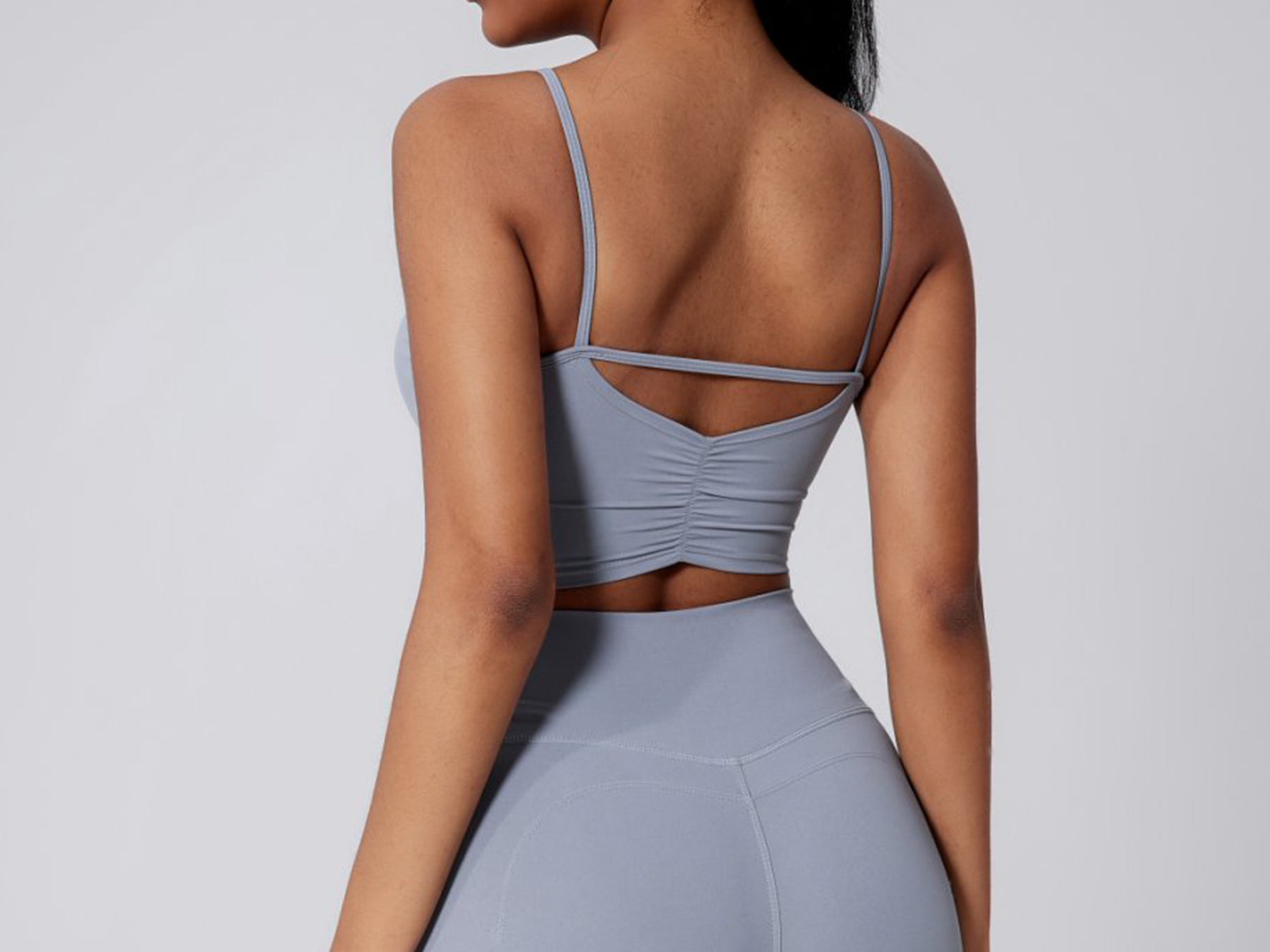 Waist-hugging pleated back